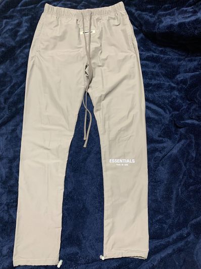 FEAR OF GOD ESSENTIALS Nylon Track Pants "Olive"