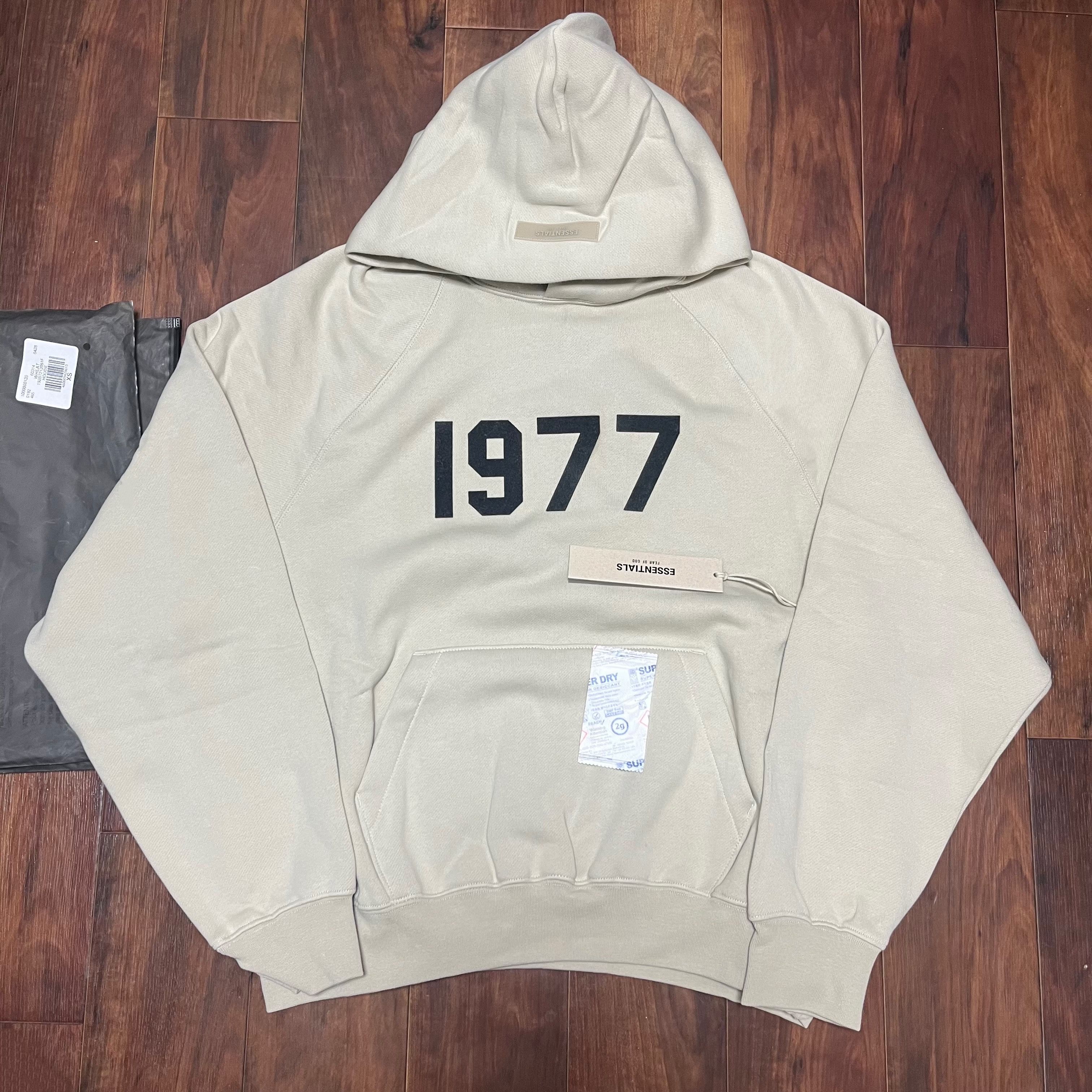 FEAR OF GOD ESSENTIALS 1977 HOODIE "Wheat"
