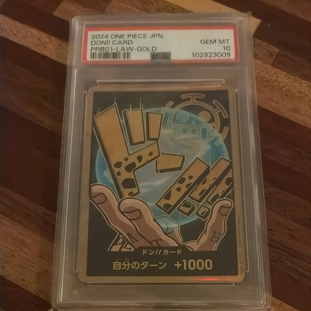 ドン!!カード : トラファルガー・ロー スーパーパラレル (プレミアムブースター「ONE PIECE CARD THE BEST」)