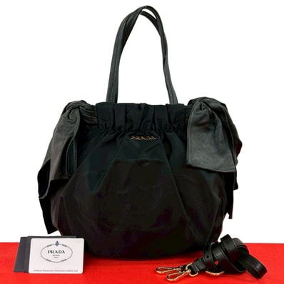 PRADA プラダ ロゴ 金具 リボン ナイロン レザー ショルダーバッグ ブラック
92702