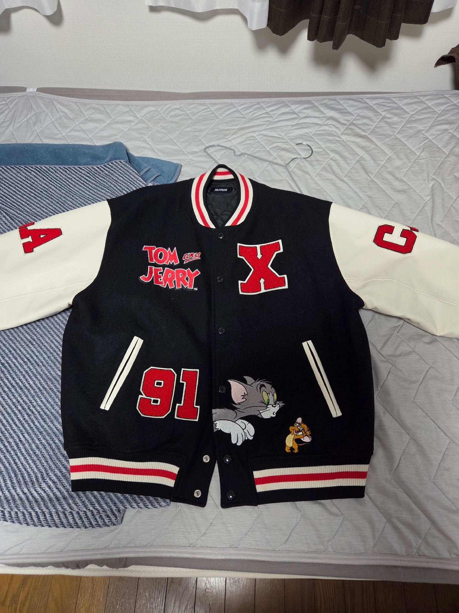 XLARGE x Tom and Jerry Versity Jacket "Black"