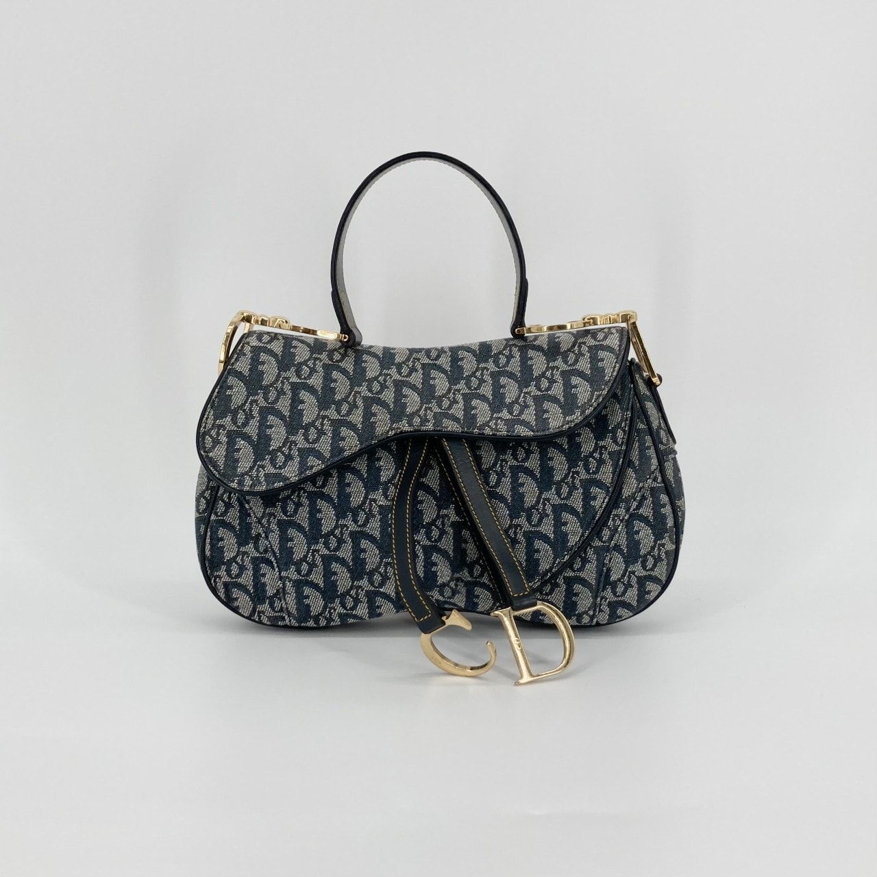 Christian Dior(クリスチャンディオール) サドルフラップ トロッター柄 ゴールドC.D.ストラップ付 ショルダーバッグ ネイビー