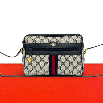 GUCCI グッチ シェリーライン GG 柄 ロゴ 金具 レザー PVC ショルダーバッグ ネイビー
29980