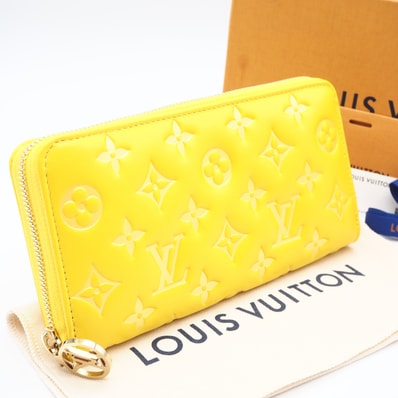 未使用 LOUIS VUITTON ルイ・ヴィトン モノグラム エンボス ジッピーウォレット M13699 長財布 イエロー ラムスキン レディース