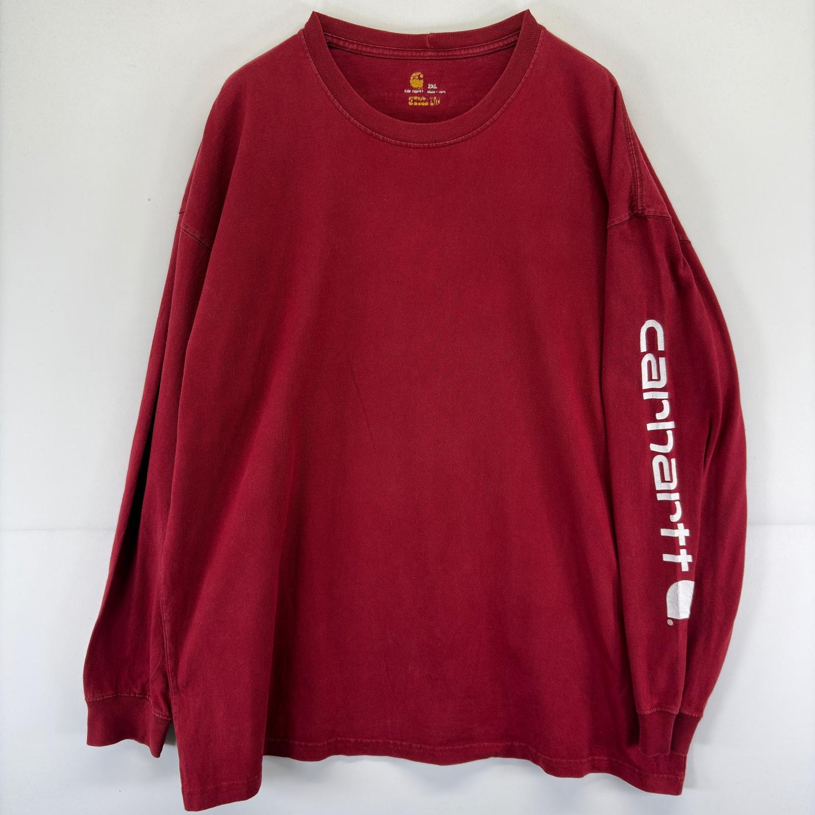 古着 カーハート Carhartt 長袖Tシャツ プリント クルーネック 大きいサイズ 袖ロゴ 2XL  レッド 無地 メンズ
