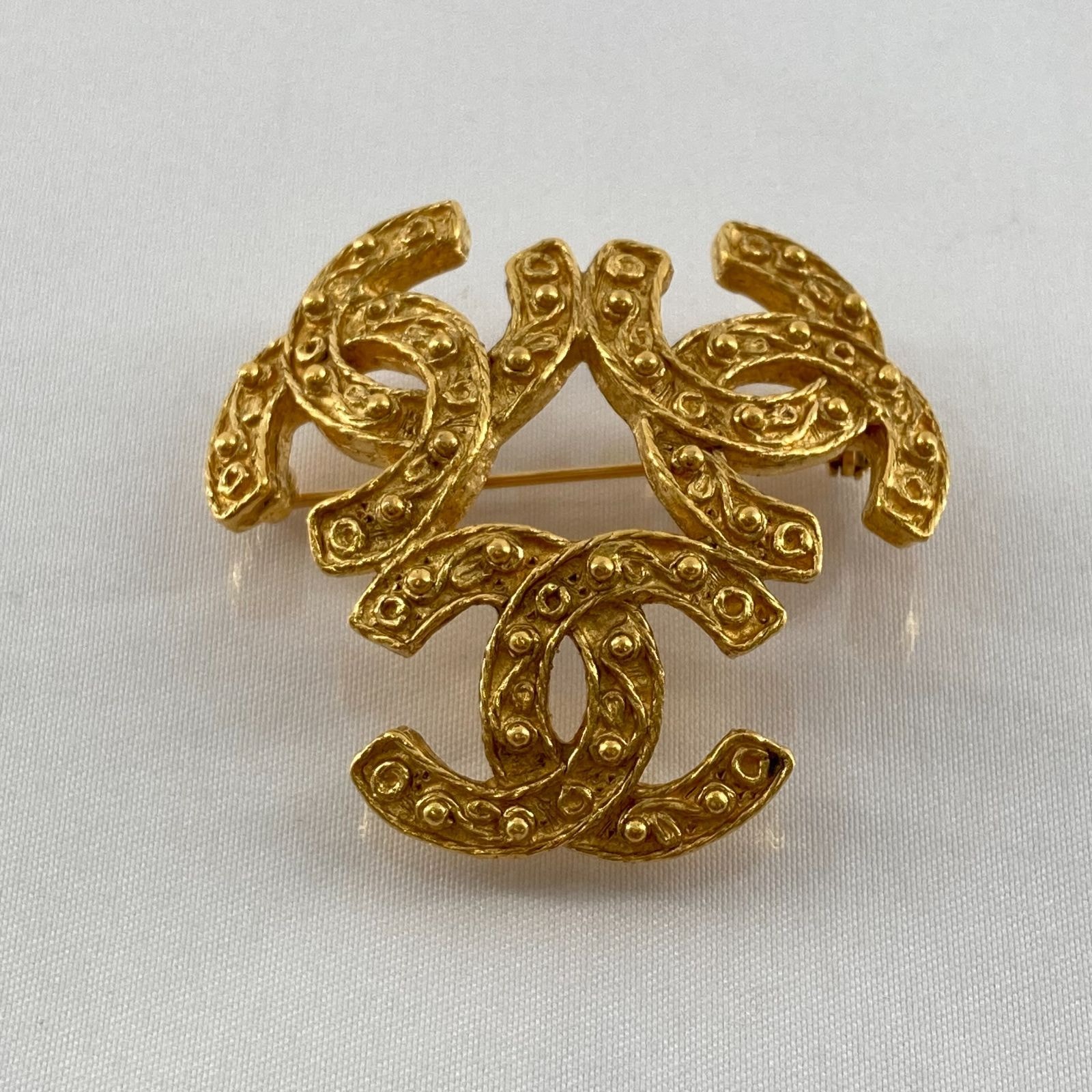CHANEL(シャネル)ヴィンテージ トリプルココマークブローチ 94・A ゴールド