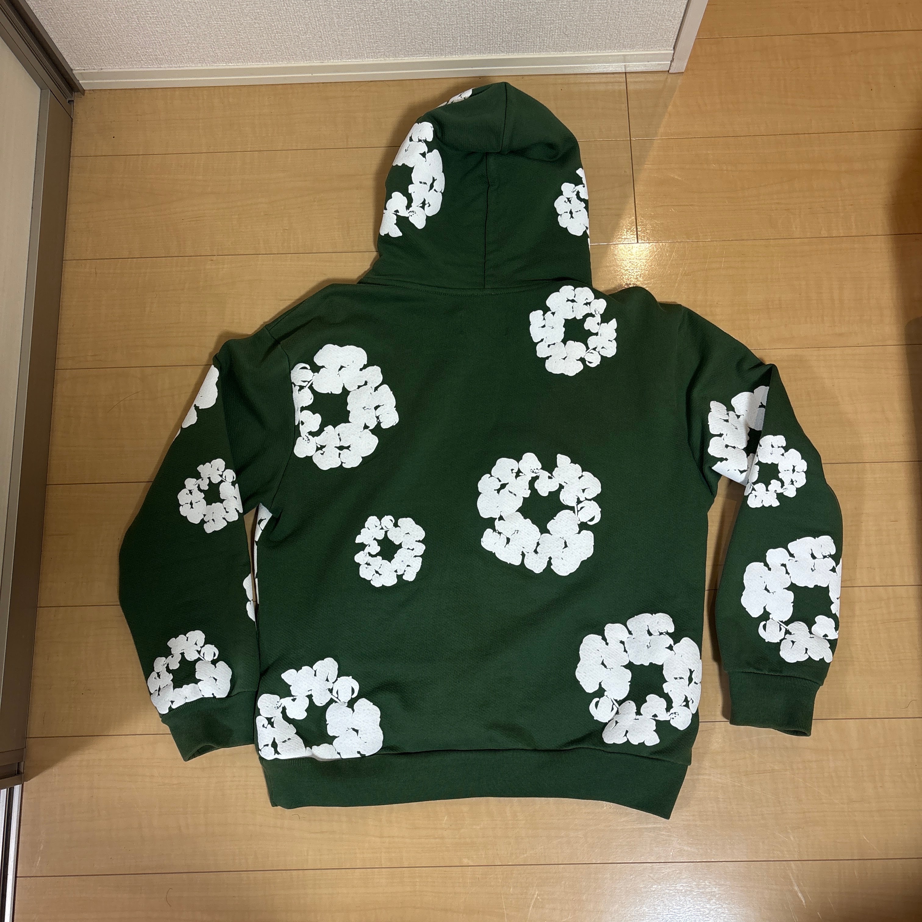DENIM TEARS The Cotton Wreath Sweatshirt "Green"