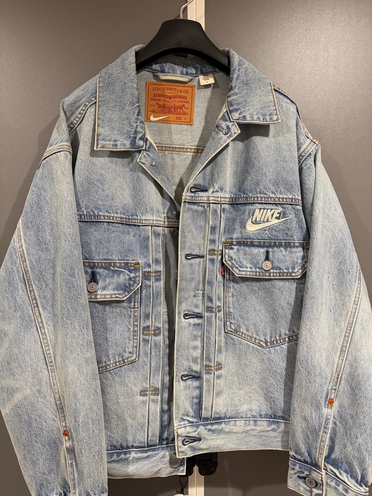 Levi's x Nike Denim Trucker Jacket "Light Indigo" 002TM-0000