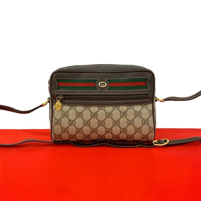GUCCI グッチ シェリーライン GG ロゴ 金具 レザー PVC ショルダーバッグ ブラウン
33558