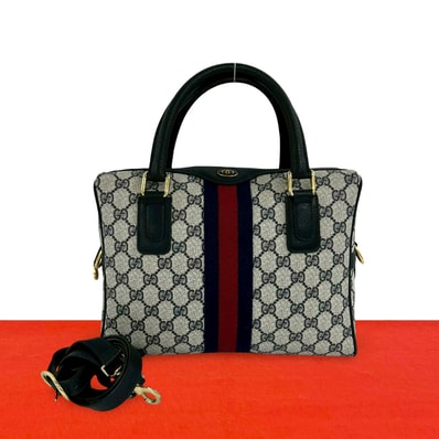 GUCCI グッチ シェリーライン GG ロゴ 柄 金具 レザー PVC ショルダーバッグ ネイビー
94949