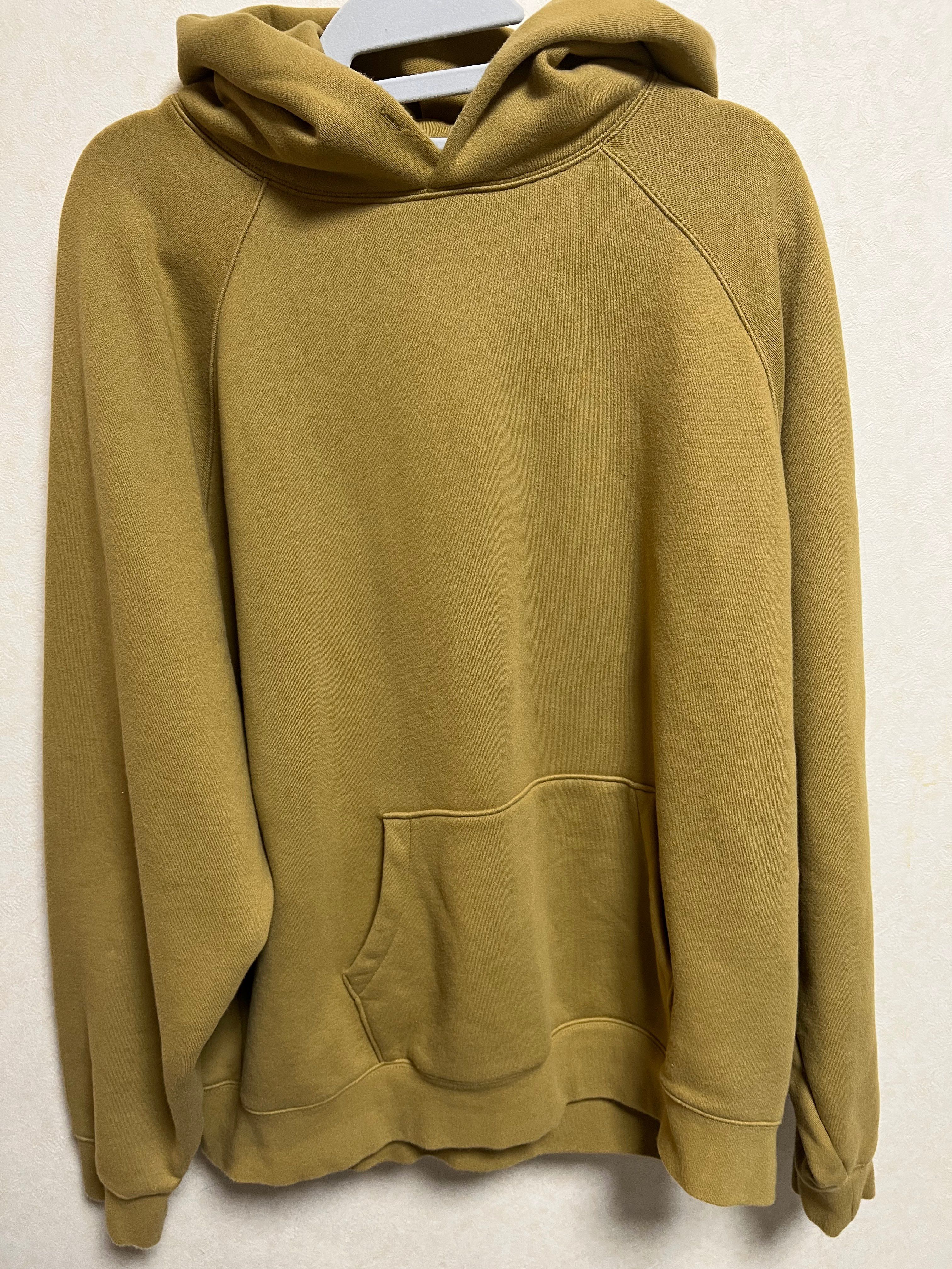 FEAR OF GOD ESSENTIALS PULLOVER HOODIE "Amber"