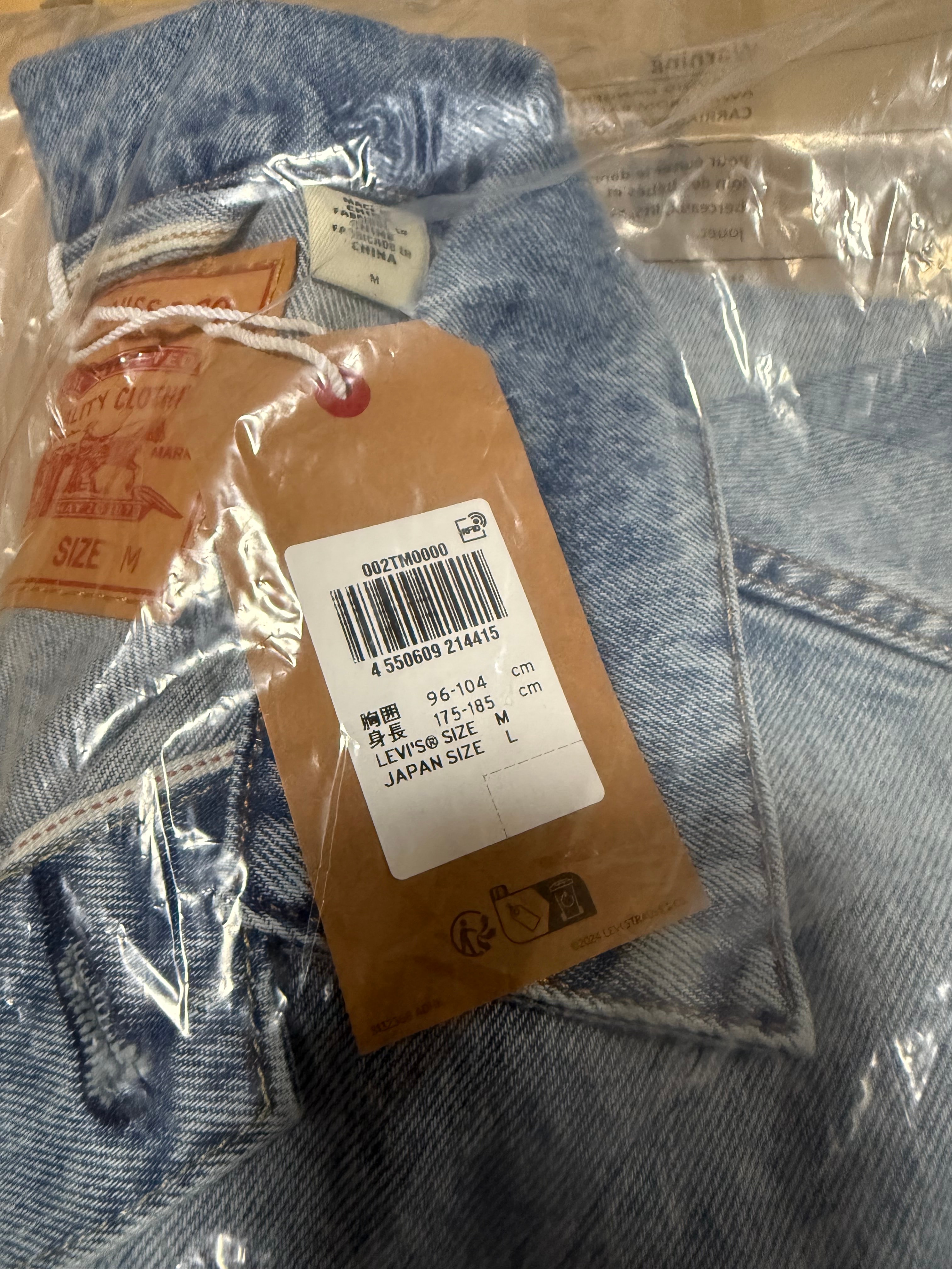 LEVI'S x Nike Denim Trucker Jacket "Light Indigo" 002TM-0000