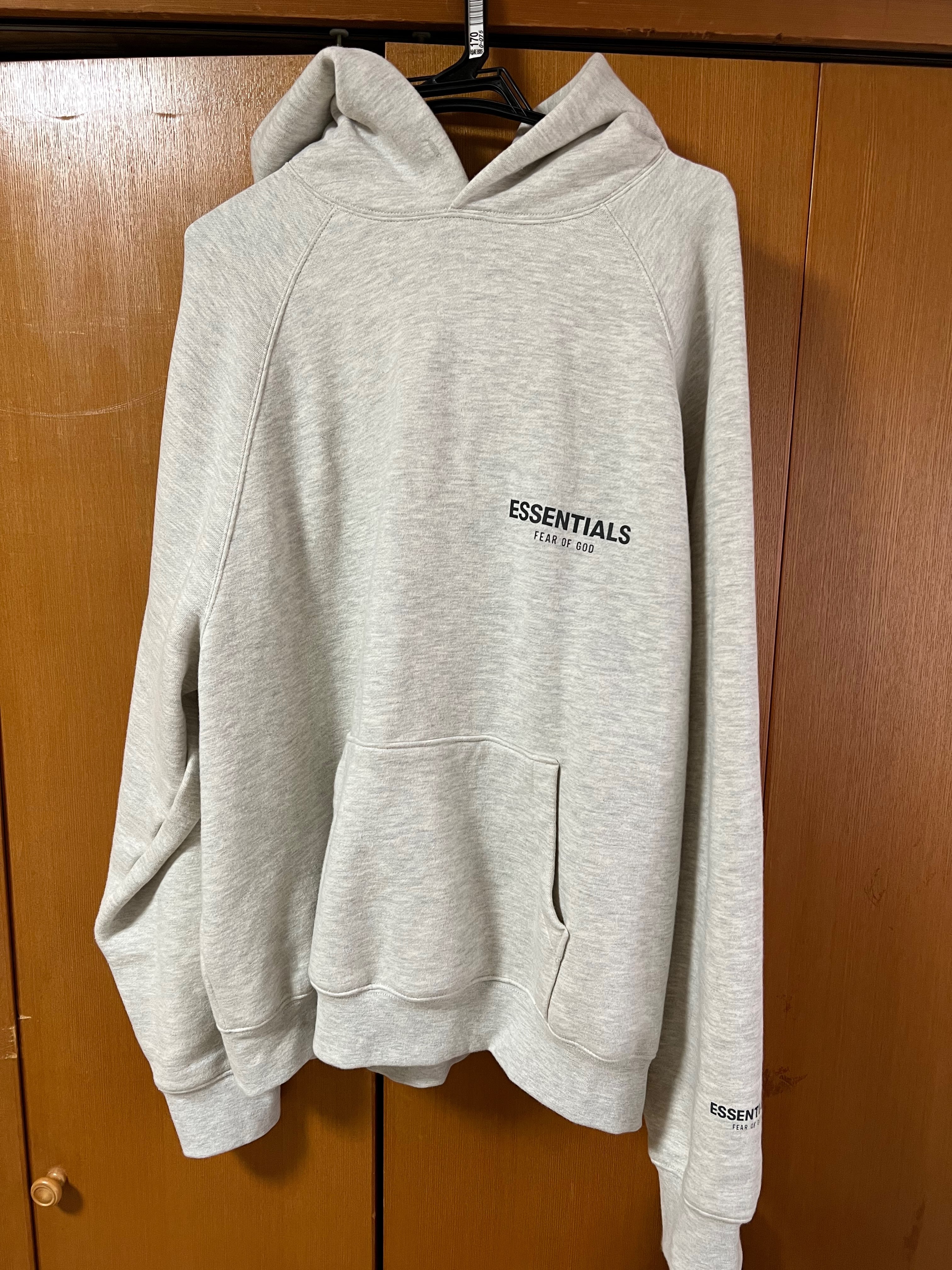 FEAR OF GOD ESSENTIALS PULLOVER HOODIE "Light Heather Oatmeal"