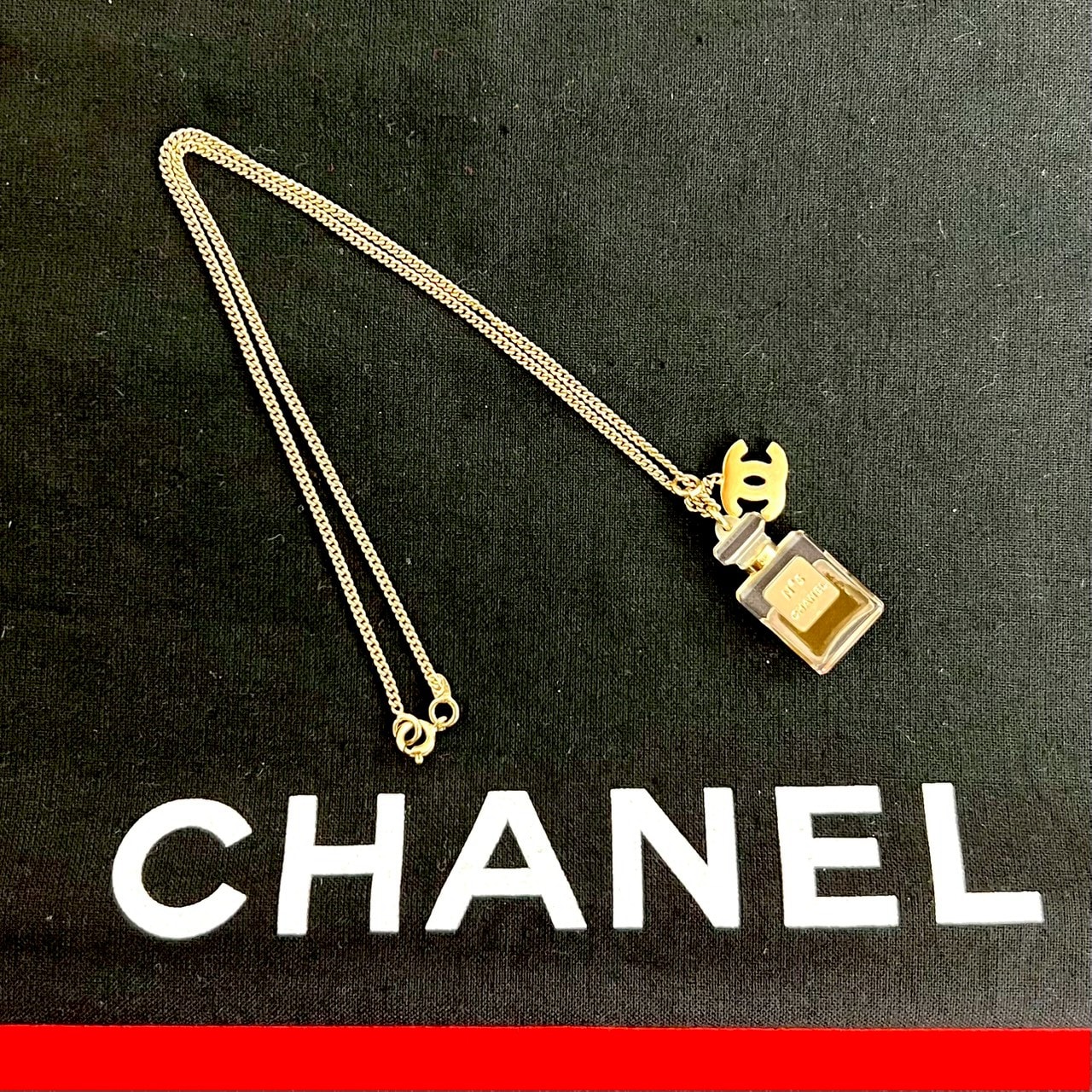 CHANEL シャネル ココマーク ナンバー5 モチーフ GP レジン ネックレス ゴールド
 97719