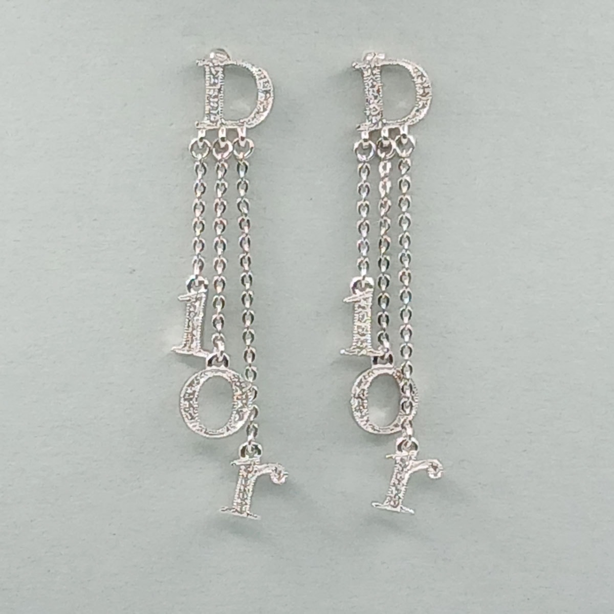 【値下げ】 Christian Dior クリスチャンディオール ロゴ ラインストーン スイング ピアス ピアス メタル シルバー  レディース【中古】