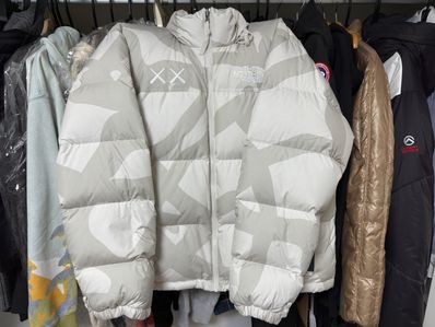 The North Face Kaws Retro 1996 Nuptse Jacket "Moonlight Ivory"