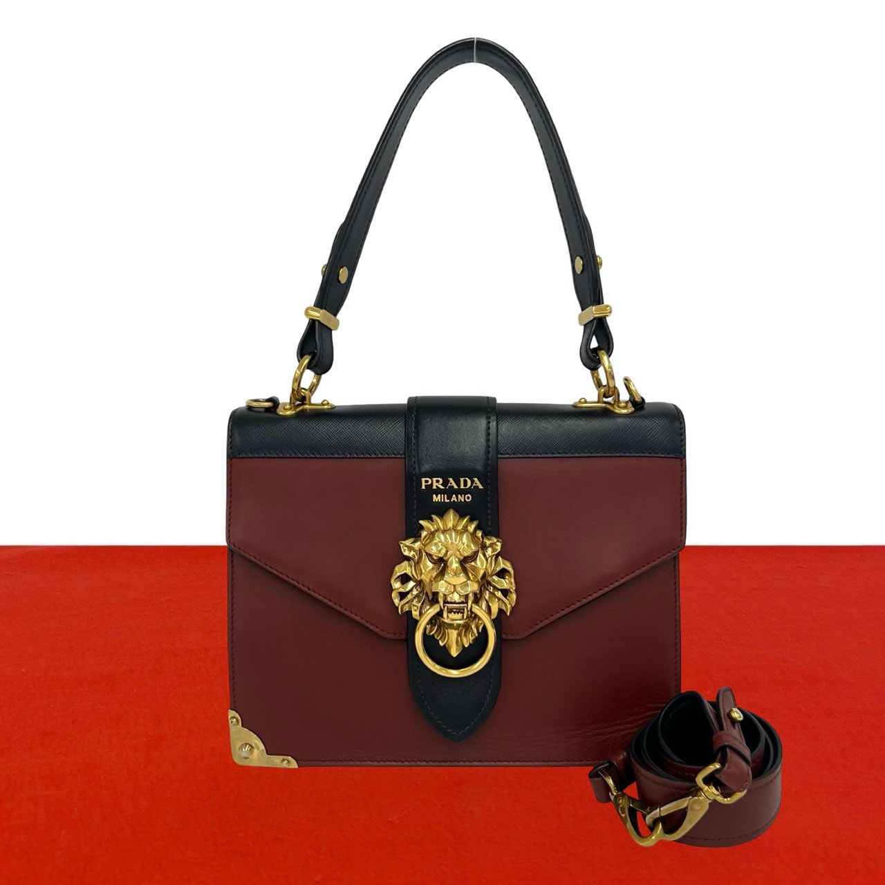 PRADA プラダ カイエ ライオンヘッド ロゴ 金具 レザー ショルダーバッグ ワインレッド
49272