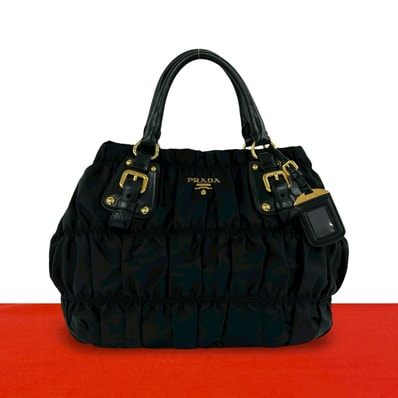 PRADA プラダ ロゴ 金具 ギャザー ナイロン レザー ハンドバッグ ブラック
09706