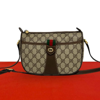 GUCCI グッチ シェリーライン GG ロゴ 金具 PVC レザー ショルダーバッグ ブラウン
00816