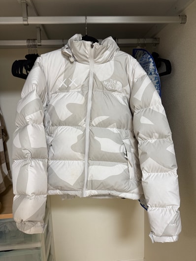 The North Face Kaws Retro 1996 Nuptse Jacket "Moonlight Ivory"