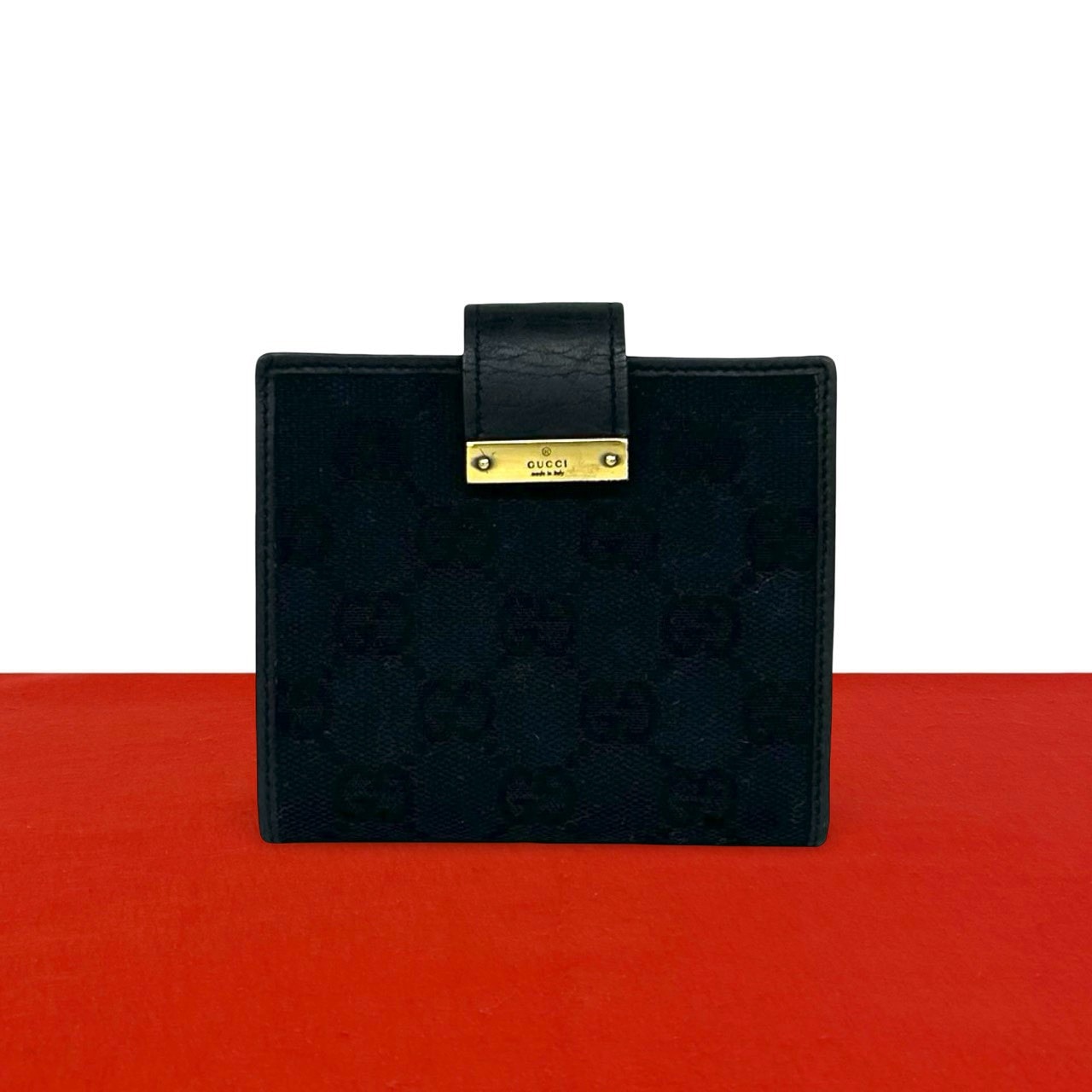 GUCCI グッチ ロゴ 金具 GG 柄 キャンバス レザー 二つ折り財布 ブラック
67810