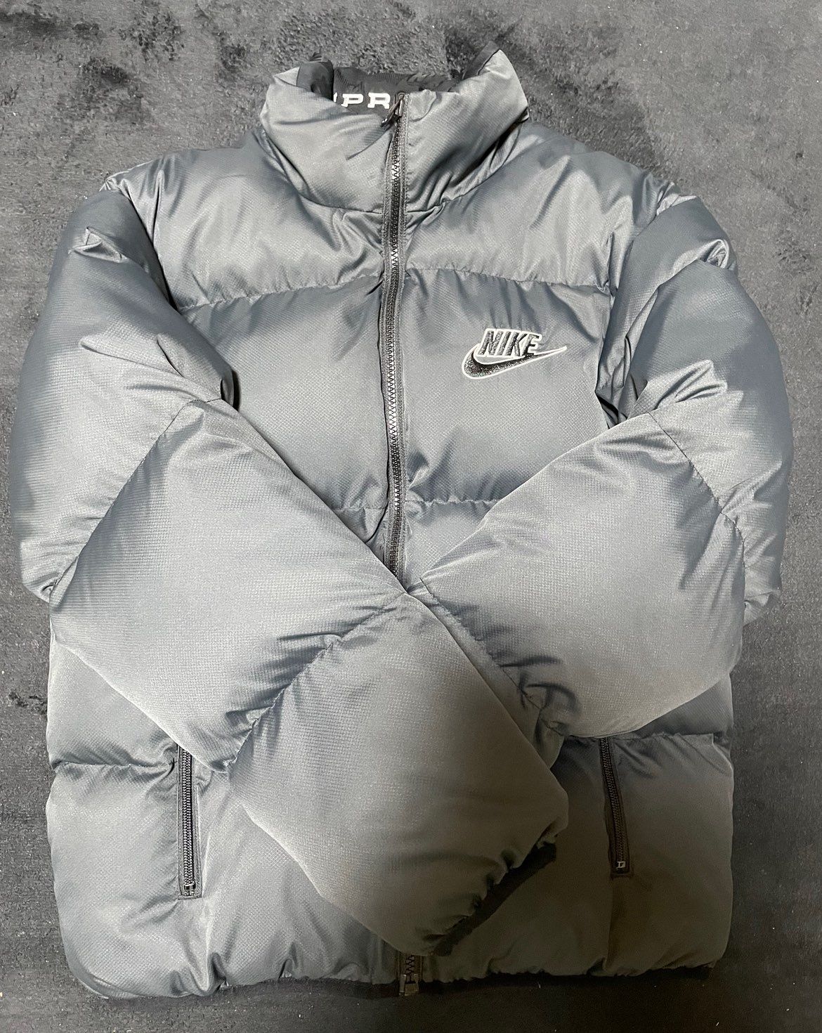 Supreme / Nike® Reversible Puffy Jacket "Black"