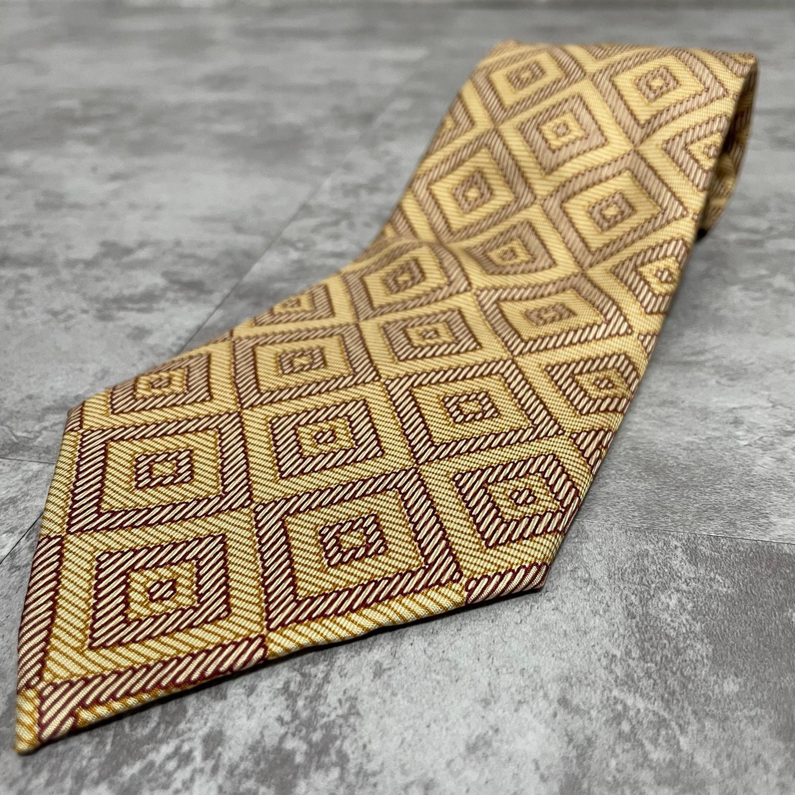 【HERMES】エルメス ロープ柄 ダイヤモンド 菱形 幾何学 総柄 ネクタイ ベージュ ゴールド 金 ブラウン 茶 シルク100% フランス製 メンズ