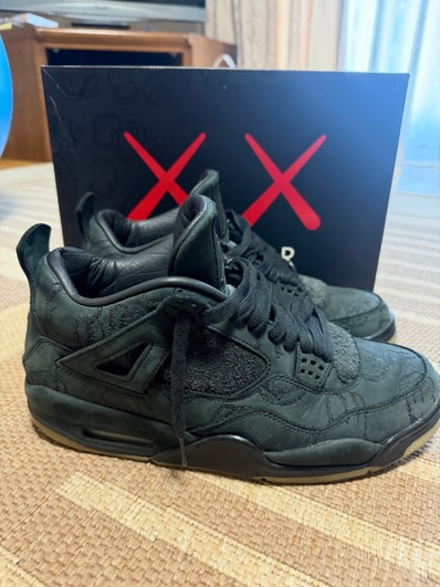 KAWS × Nike Air Jordan 4 Retro "Black"