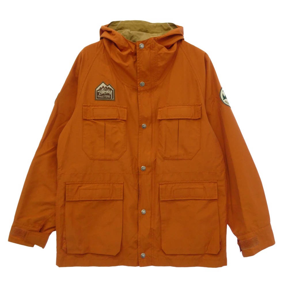 STUSSY ステューシー 00s AUTHENTIC GEAR 60/40 コットンナイロン クロス ロゴパッチ ジップアップ フーデッド マウンテンパーカー ジャケット アウター オレンジ系 L【中古】