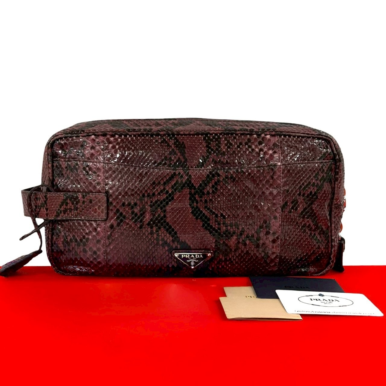 PRADA プラダ 三角ロゴ 金具 パイソン クラッチバッグ ワインレッド
 38078