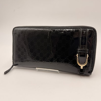GUCCI(グッチ)マイクログッチシマ 長財布 ラウンドファスナーウォレット ブラック パテントレザー ゴールドトーン金具 レディース