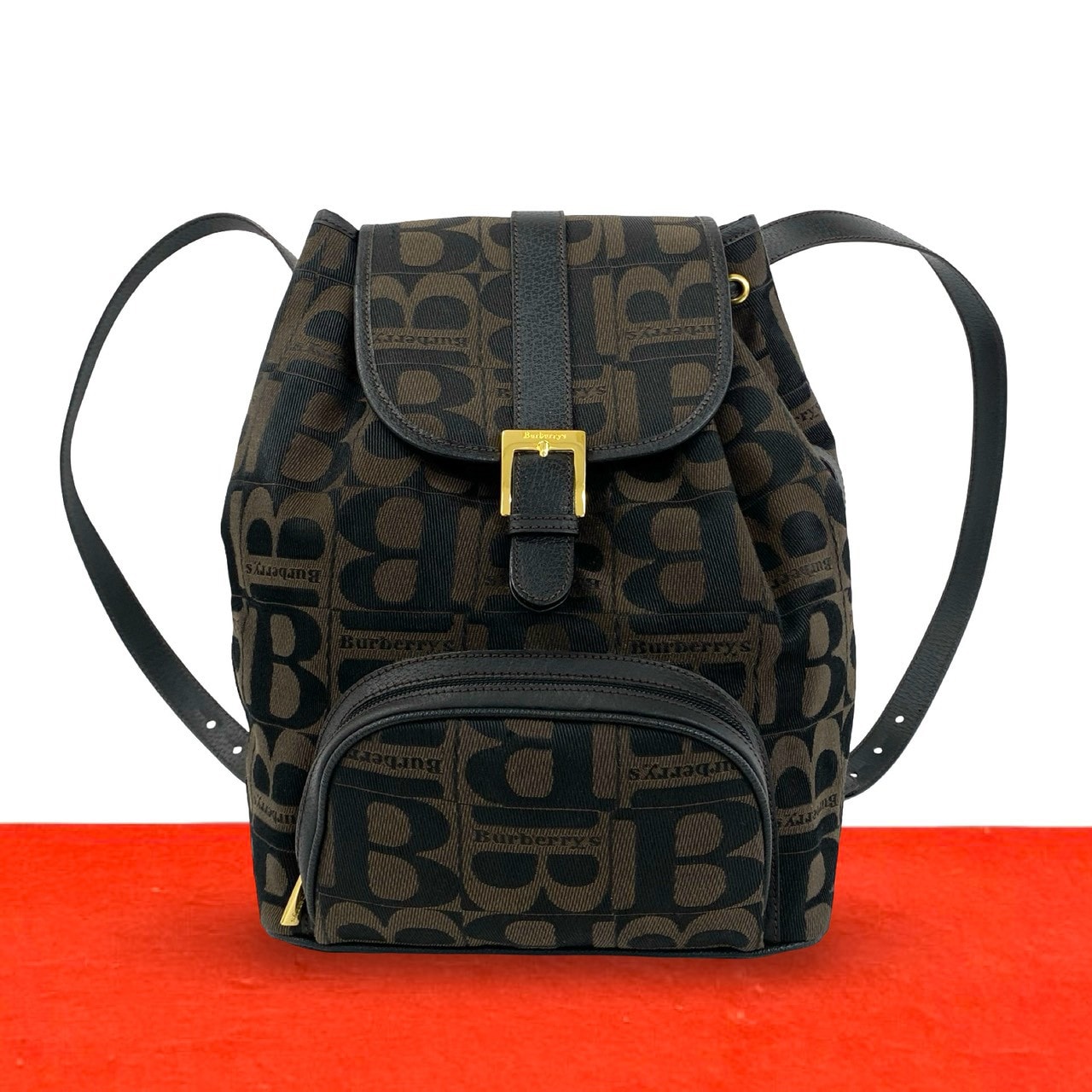 BURBERRY バーバリー ロゴ 金具 総柄 キャンバス レザー リュックサック ブラウン
 07049