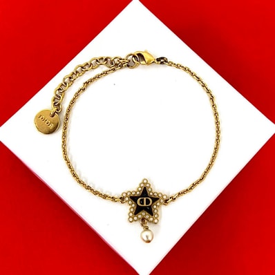Christian Dior ディオール CD ロゴ スター モチーフ GP フェイクパール ブレスレット ゴールド
47253