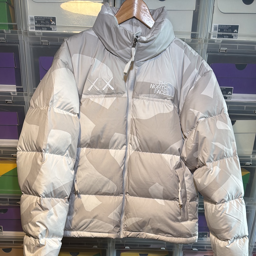 The North Face Kaws Retro 1996 Nuptse Jacket "Moonlight Ivory"