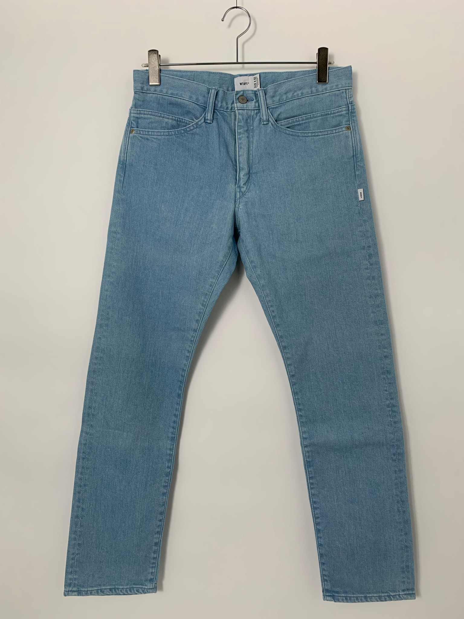 WTAPS BLUES. V.S. / TRASH. TROUSERS Indigo