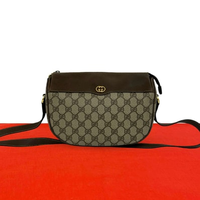 GUCCI グッチ GG ロゴ 金具 PVC レザー ショルダーバッグ ブラウン
32649