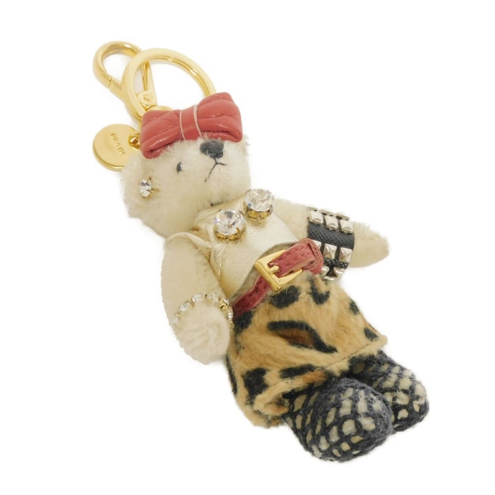 PRADA プラダ テディ ベア クリスタル ラインストーン スタッズ チャーム クマ リボン レオパード ロゴメダリオン サフィアーノ ファブリック ホワイト キーホルダー