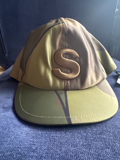 sacai KAWS S Cap "Camo"