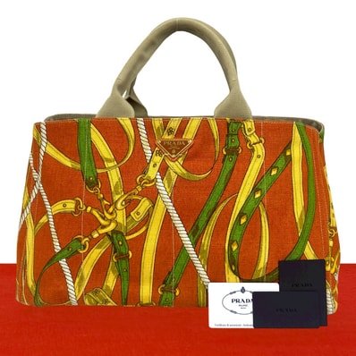 PRADA プラダ カナパ 三角ロゴ 金具 キャンバス ハンドバッグ オレンジ
66677