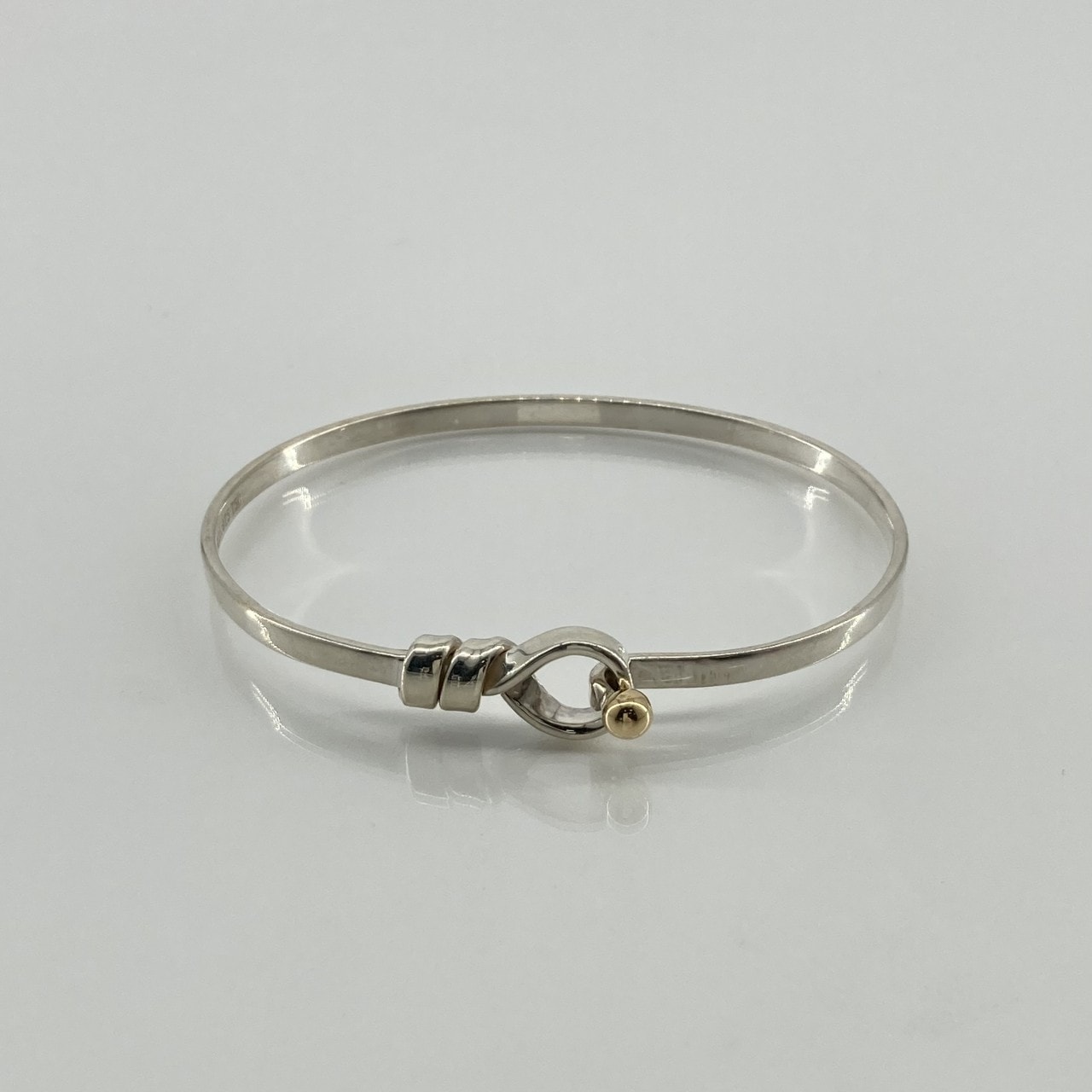 TIFFANY&Co.(ティファニー) フック&アイ Ag925 / K18イエローゴールド バングル 9.29g シルバー×ゴールド