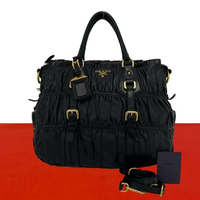 PRADA プラダ ロゴ 金具 ギャザー レザー ショルダーバッグ ブラック
25523