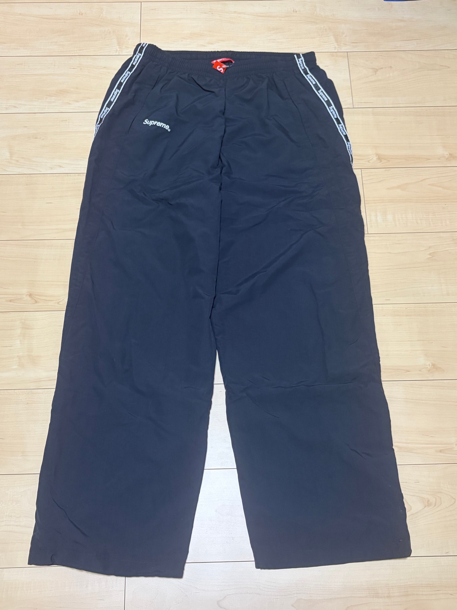 Supreme Logo Taping Track Pant "Black"