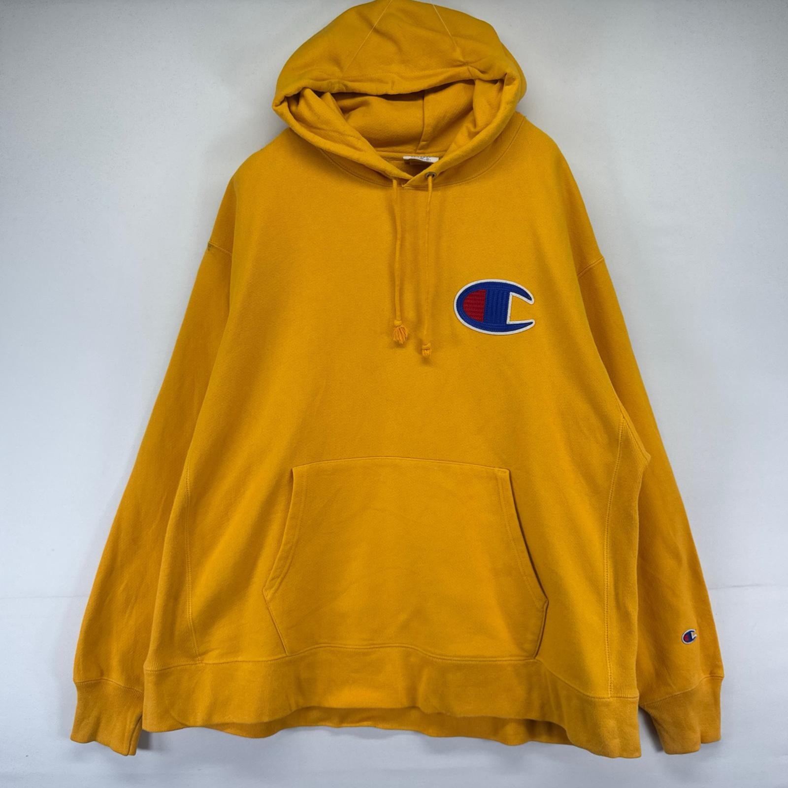 古着 チャンピオン Champion パーカー フーディー プルオーバー ワッペン リバースウィーブ 大きいサイズ 2XL  イエロー系 メンズ