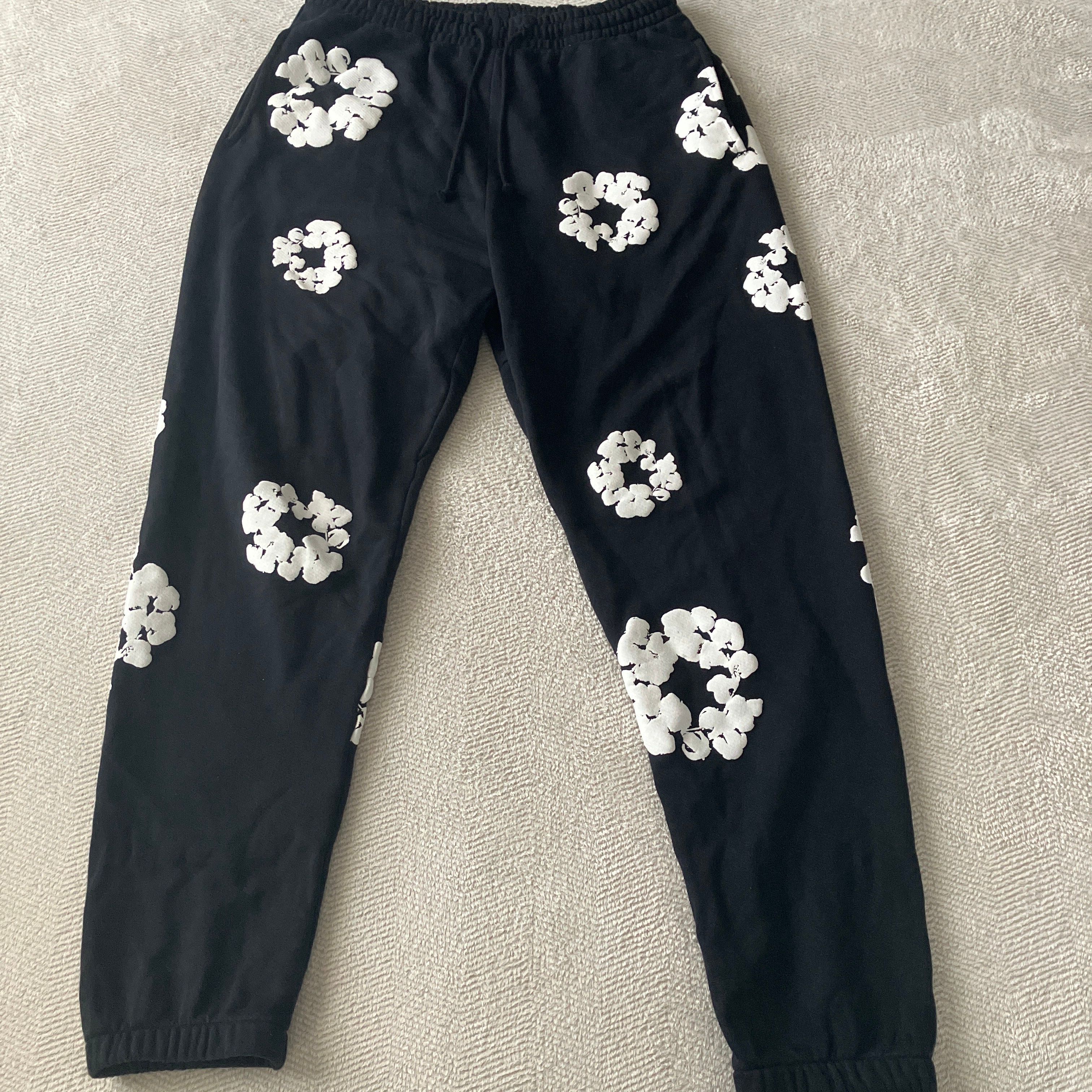 DENIM TEARS The Cotton Wreath Sweat Pants "Black"
