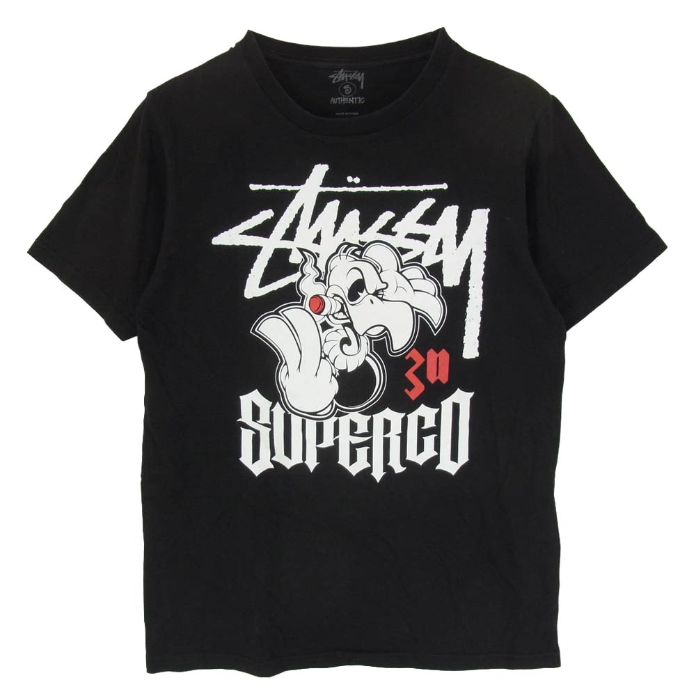 STUSSY ステューシー Tシャツ 30周年記念 × Super Co スーパーコー キャラクタープリント Tシャツ 半袖 カットソー ブラック系 S【中古】