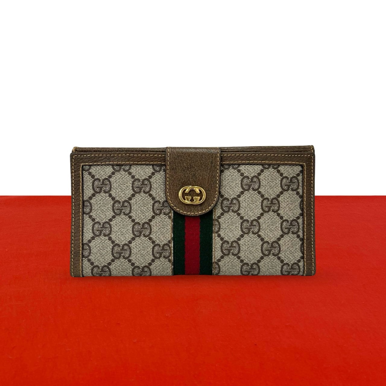 GUCCI グッチ シェリーライン GG ロゴ 金具 レザー PVC 長財布 ブラウン
25943