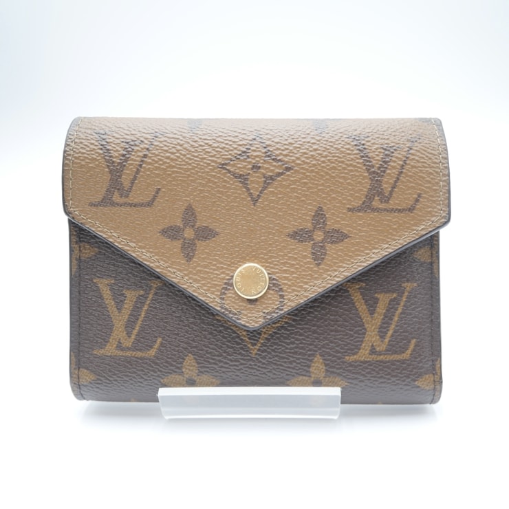 LOUIS VUITTON(ルイ・ヴィトン)ポルトフォイユ・ヴィクトリーヌ 三つ折り財布 コンパクトウォレット モノグラム・リバース ブラウン ブラック レザー ゴールド金具 レディース M81557【中古】