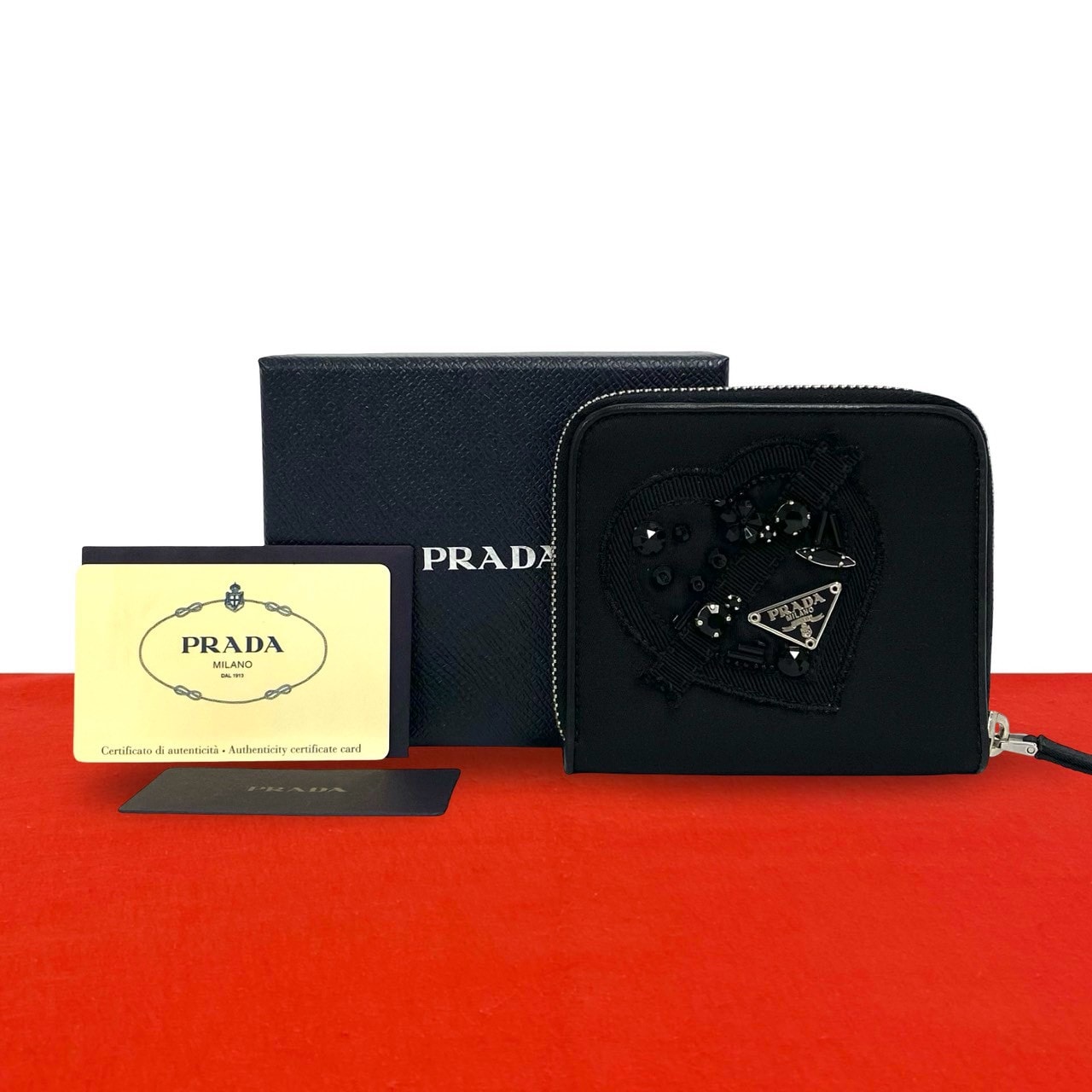 PRADA プラダ 三角ロゴ 金具 ナイロン 二つ折り財布 ブラック
29614