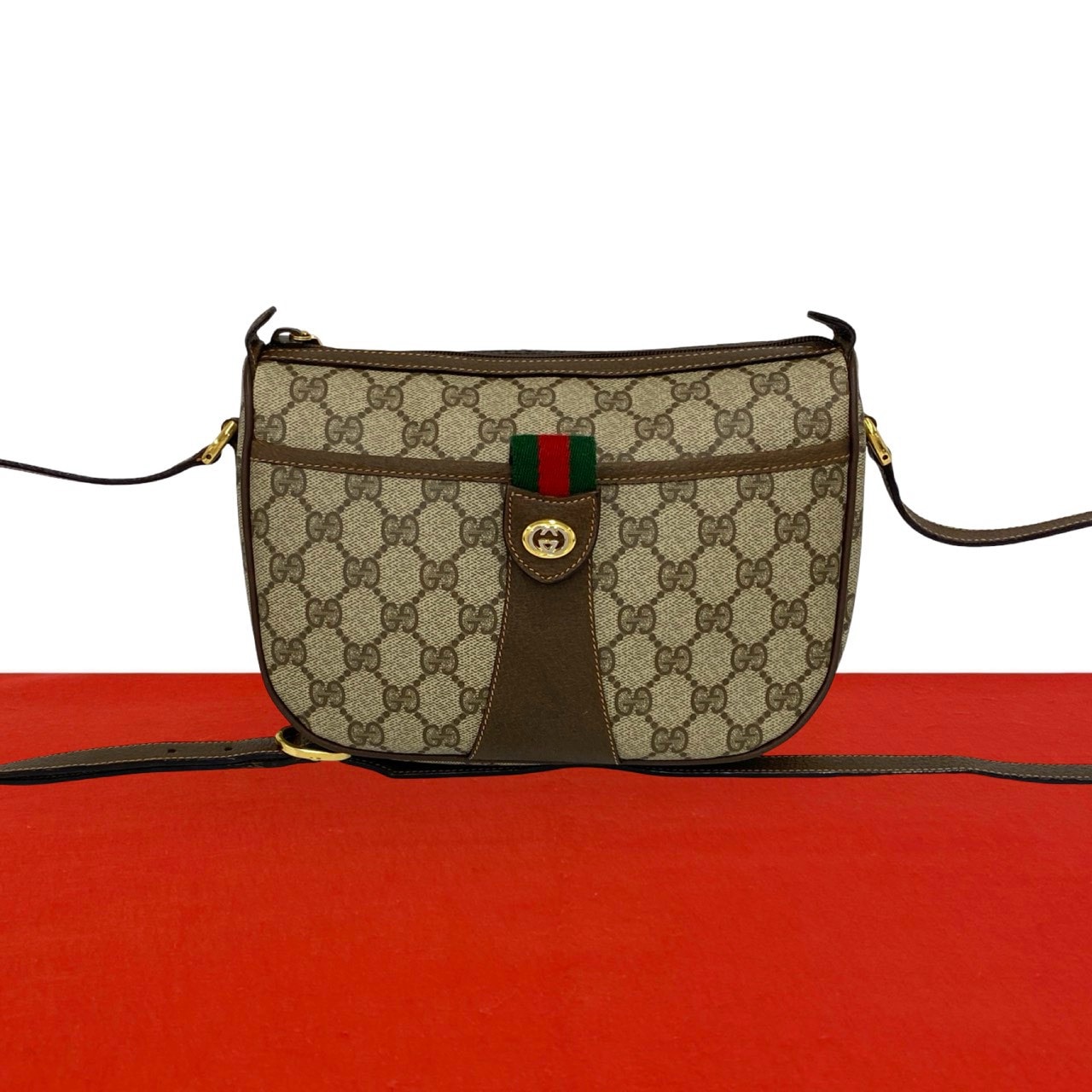 GUCCI グッチ シェリーライン GG ロゴ 金具 レザー PVC ショルダーバッグ ブラウン
17523