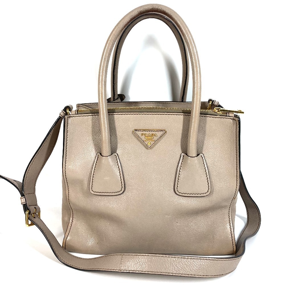 プラダ PRADA トライアングルロゴ 三角ロゴ プレート 2WAYバッグ ハンドバッグ カバン ショルダーバッグ 斜め掛け トートバッグ レザー ベージュ系